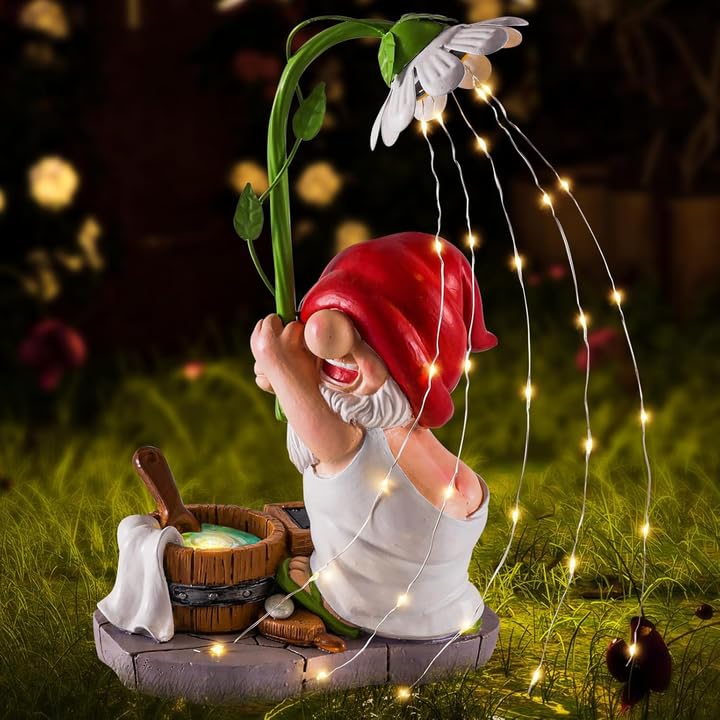 WINTS garden gnome with solar light illuminating outdoor space.