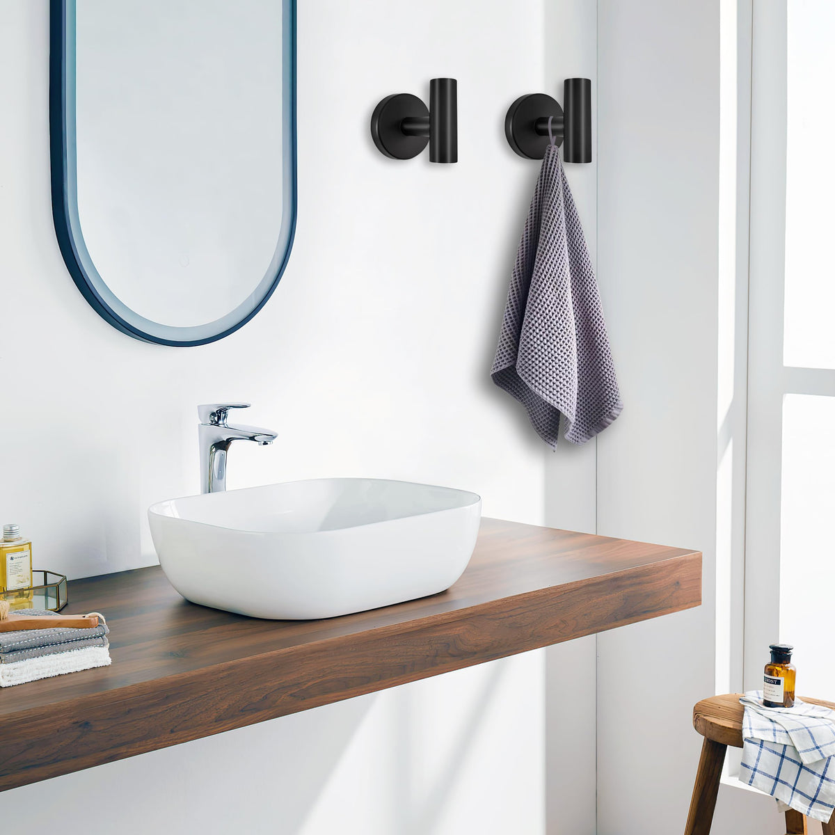 Wisexin matte black towel ring for quick-drying towels and organized storage.