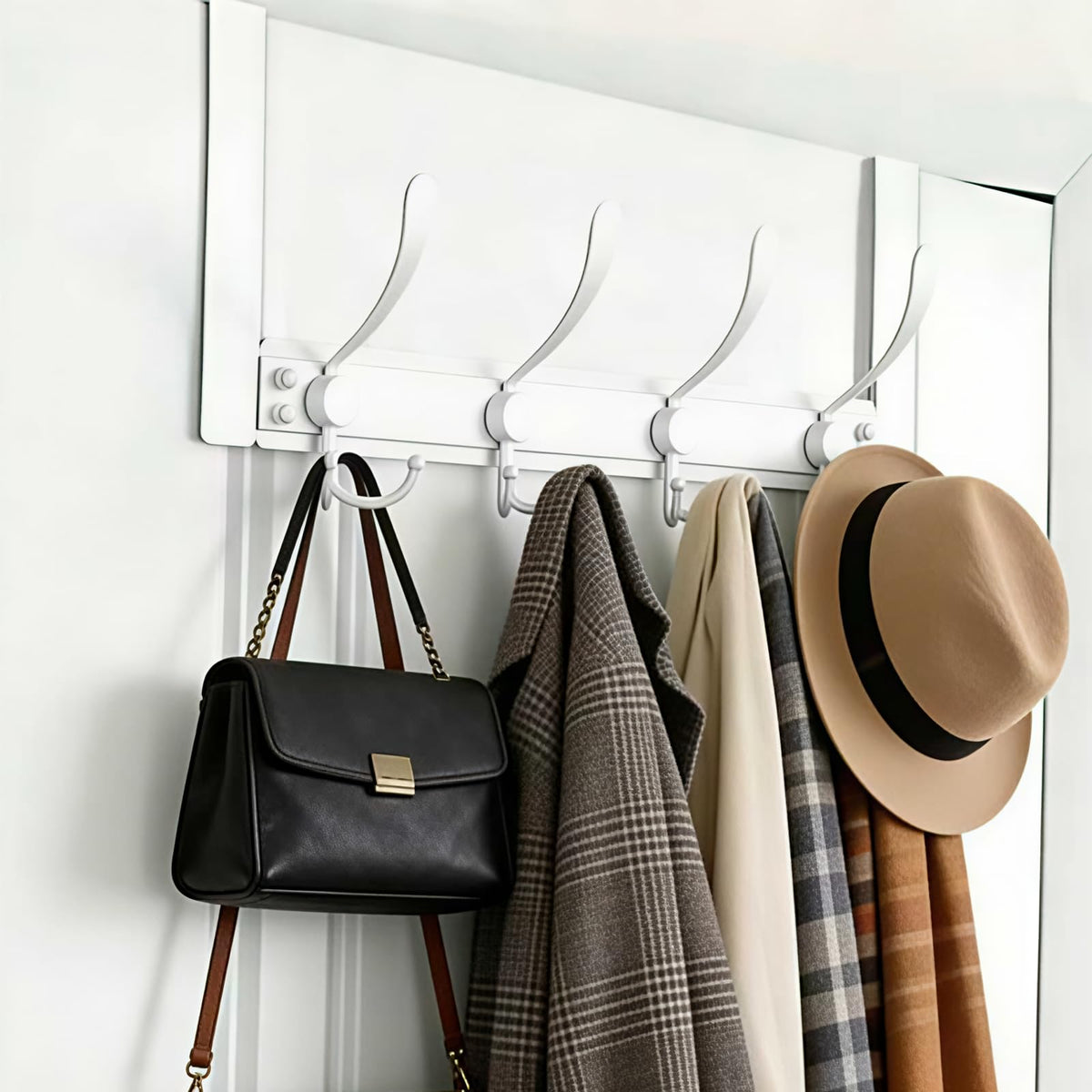 WLCSNG heavy-duty over-the-door hooks mounted on door offer strong 25 lb capacity.