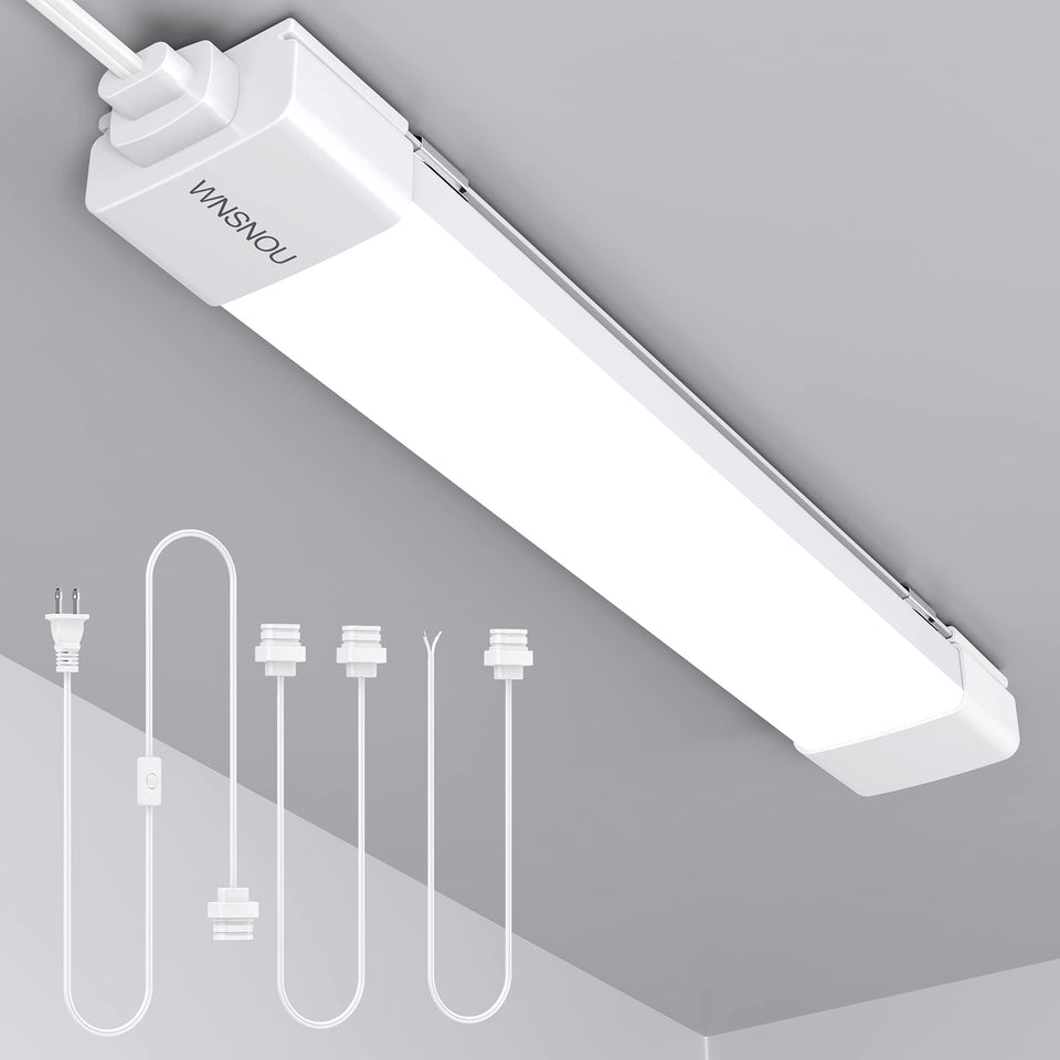 WNSNOU LED tube light fixture plug 1.4ft provides flicker-free brightness for garages.