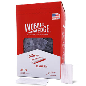 Wobble Wedges clear shim stabilizing a table for a level surface and floor protection