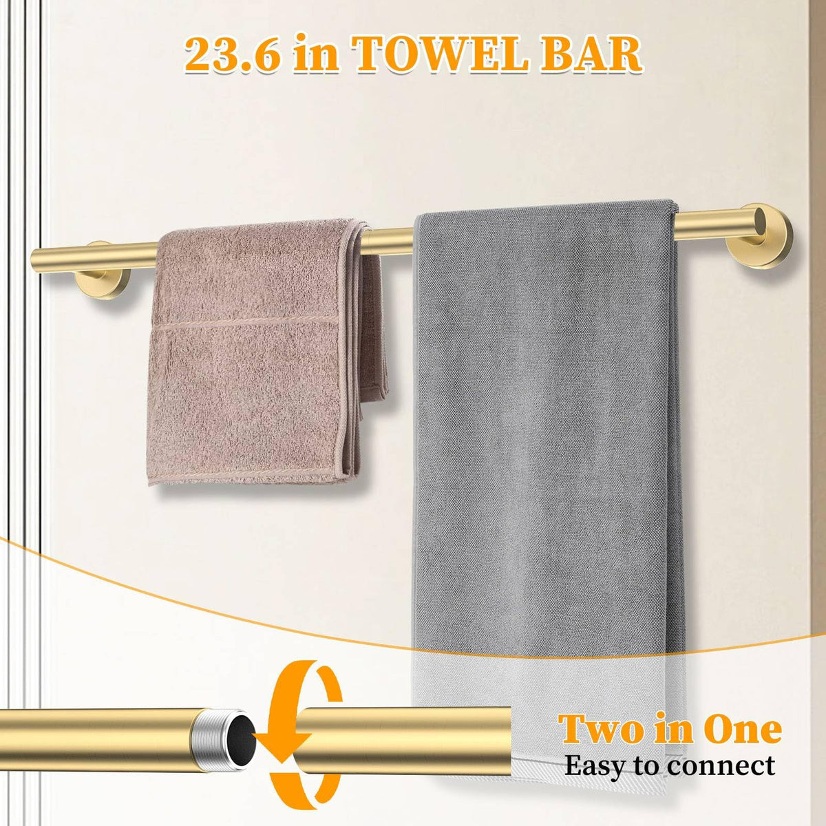 Woekme brushed gold towel ring coordinates with the bar for a cohesive bath look.