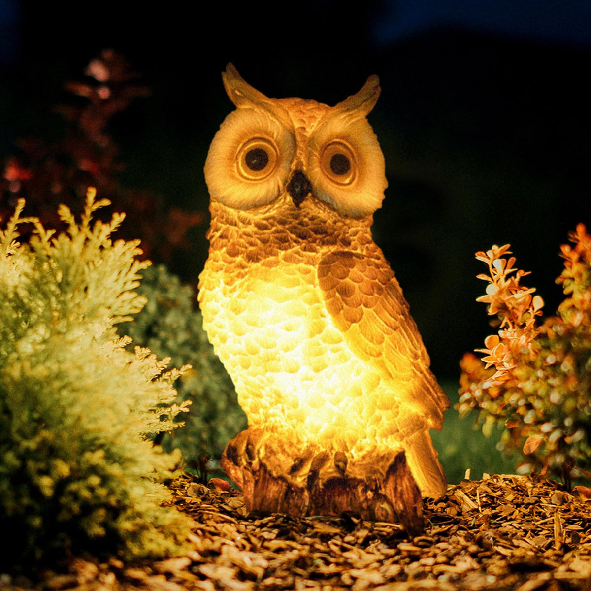 WONDHOME solar owl garden statue glowing at dusk for welcoming outdoor ambiance.
