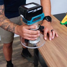 TrimFit Pro base plate mounted on a router for balanced, stable control.