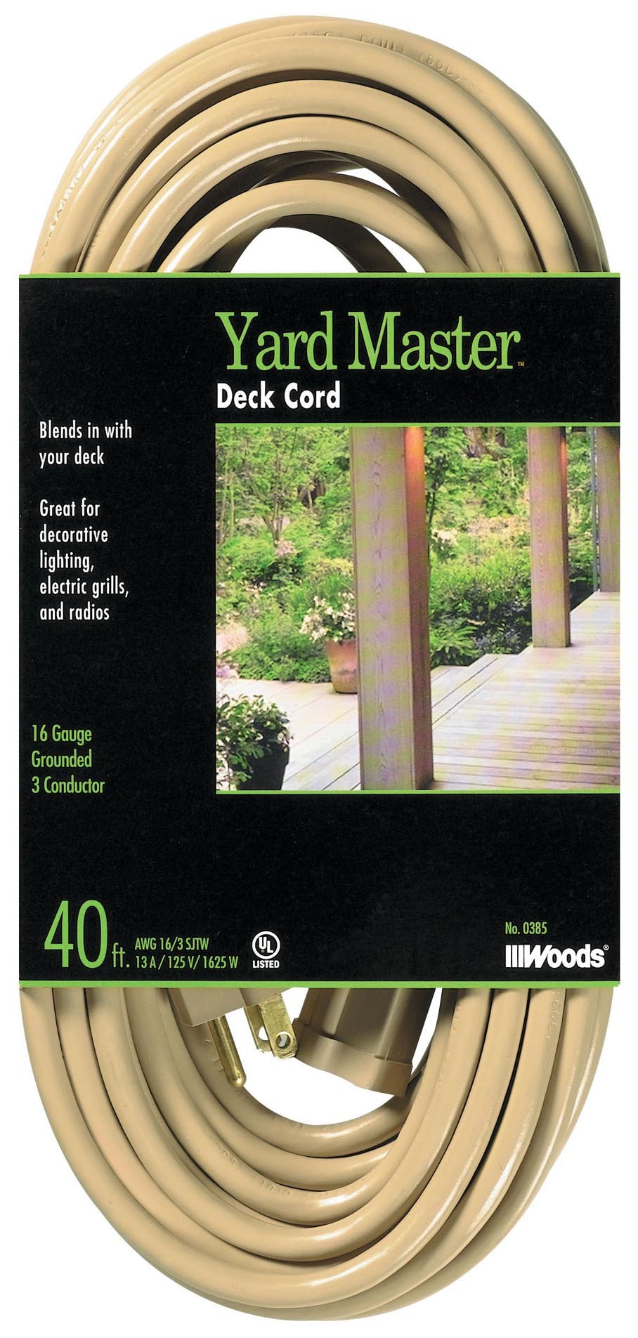 Woods Yard Master extension cord laid out beside outdoor gear for yard work and powering tools.