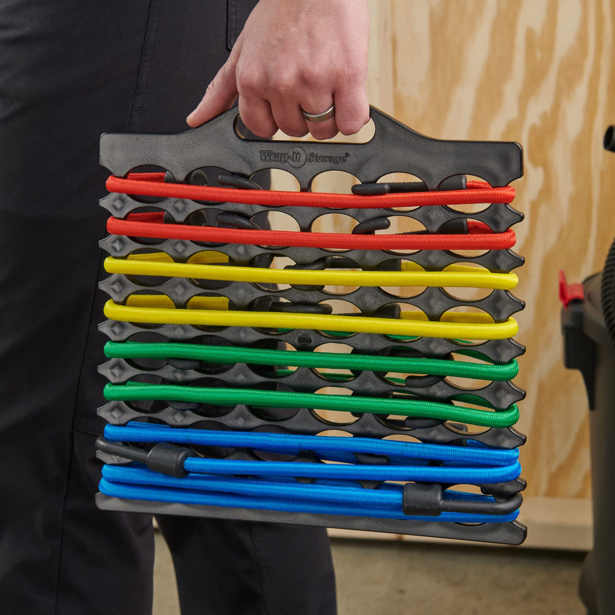 Wrap-It Storage Bungee Buddy garage-organization keeps tools and cords neat.