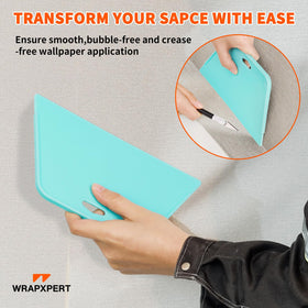 WRAPXPERT big smoothing squeegee gliding over wallpaper to press out wrinkles.