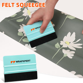WRAPXPERT felt squeegee guides into corners, smooths edges without damage.