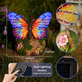 Elegant resin butterfly with warm glow from two lighting modes after dark.