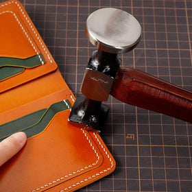 WUTA leather hammer in use stamping leather with care