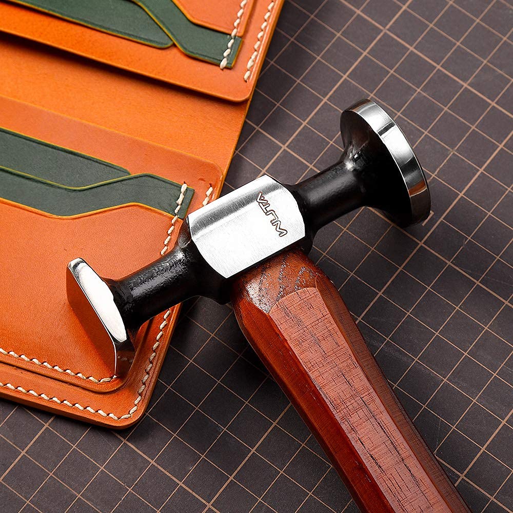 WUTA leather hammer on a workshop setup for durability demonstration