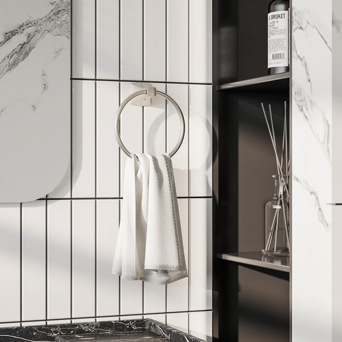 Close-up of the brushed nickel finish on the WZRUA towel ring.