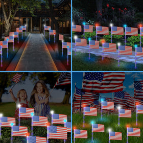 X-GiftKey flag lights show red, white and blue hues along pathways.