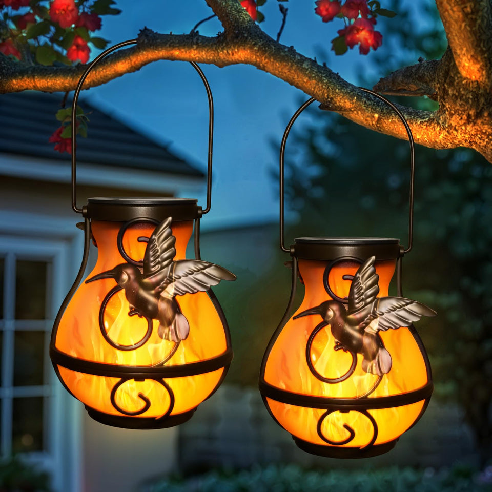X-PREK solar lantern with orange flame for cozy outdoor evenings.