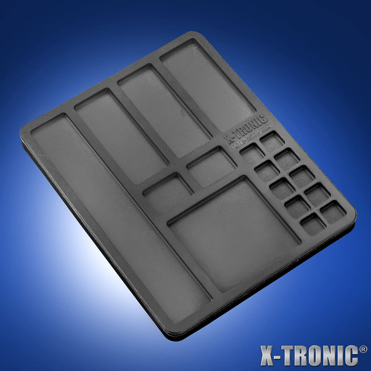 X-Tronic 3060-PRO helping hands stabilizing small components.