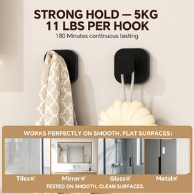 XCIXCI matte black suction hooks mounted in bathroom for rustproof organization.
