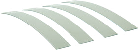 Xcluder installed on garage door jamb forming a barrier against rodents.