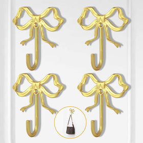 XHIPY gold bow wall hook coat hanger for easy, accessible jackets.