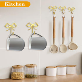 XHIPY gold bow wall hook adds entryway decor and function.
