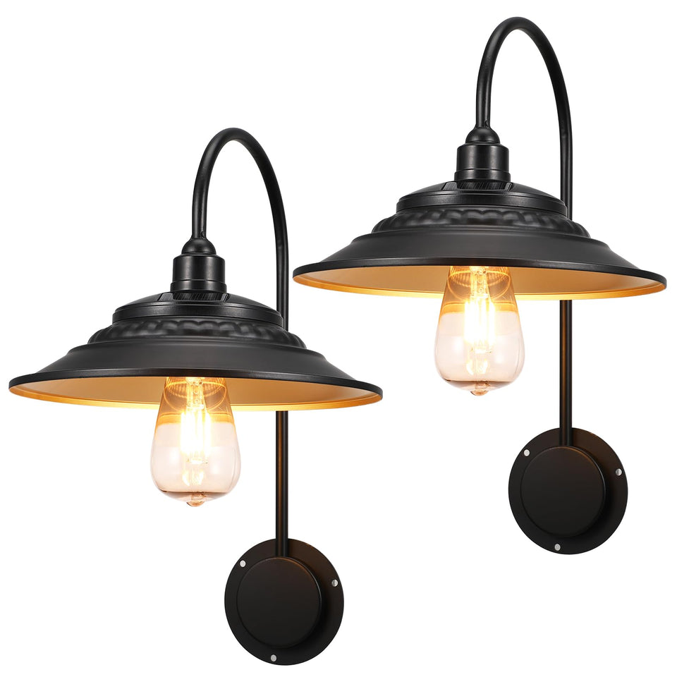 XIFEINIU solar barn light gooseneck black with gold interior illuminates outdoor spaces at dusk.