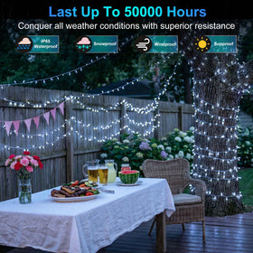 XIKENGSHQ 350LED 90FT lights illuminate a garden with a soft, inviting glow
