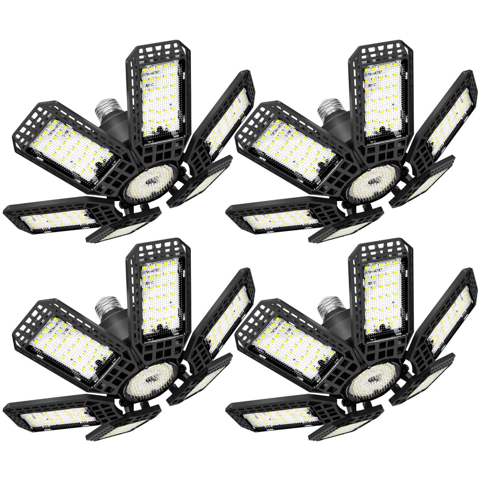 XILLUMI CORE four-pack garage lights illuminate a workshop with ultrabright, even coverage.
