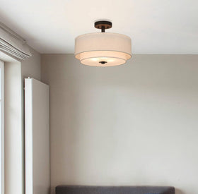 XiNBEi Lighting shade detail with dual fabric drums adds warmth to living rooms.