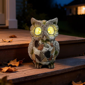 Xintim garden owl statue with solar eyes lighting at dusk