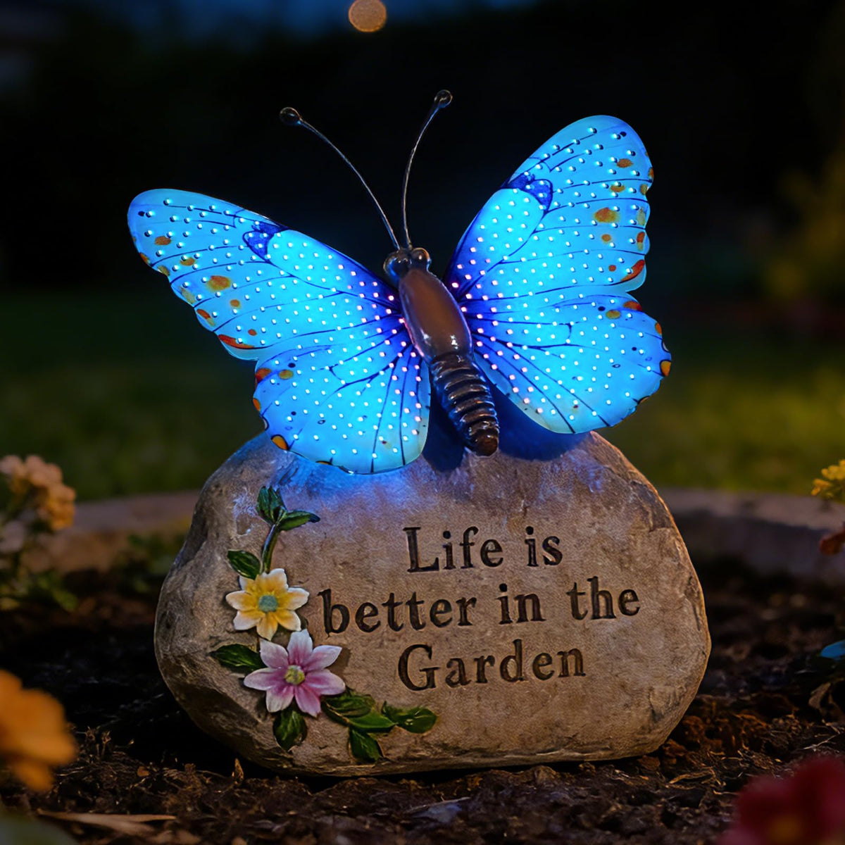XMHBCSM solar LED butterfly garden statue front view adds vivid blue color to outdoor spaces