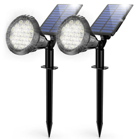 XTGTP Solar Spot Light with 21 LEDs providing bright outdoor illumination for garden paths