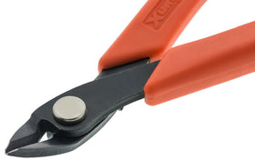 Xuron Maxi-Shear 2175 cutting tiger tail wire for durable bead strings.