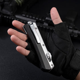 Nine-inch open length shows balanced grip for camping and daily use.
