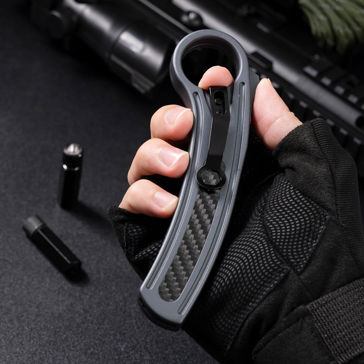 XXV knife with belt clip for hands-free EDC access.