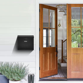 xydled modern black steel postbox complements contemporary exteriors