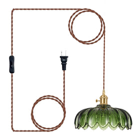 XZHGCEE green glass pendant light over island for bright task lighting.