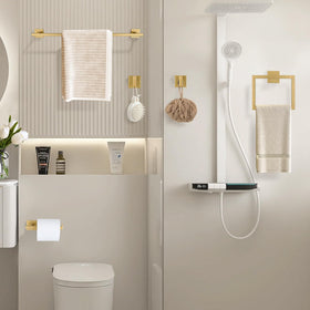 YACVCL brushed gold towel bar demonstrates space-saving design for compact bathrooms.