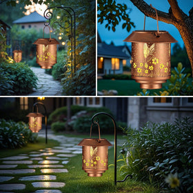 Yamodoor openwork design hummingbird lantern casts decorative shadows at night.