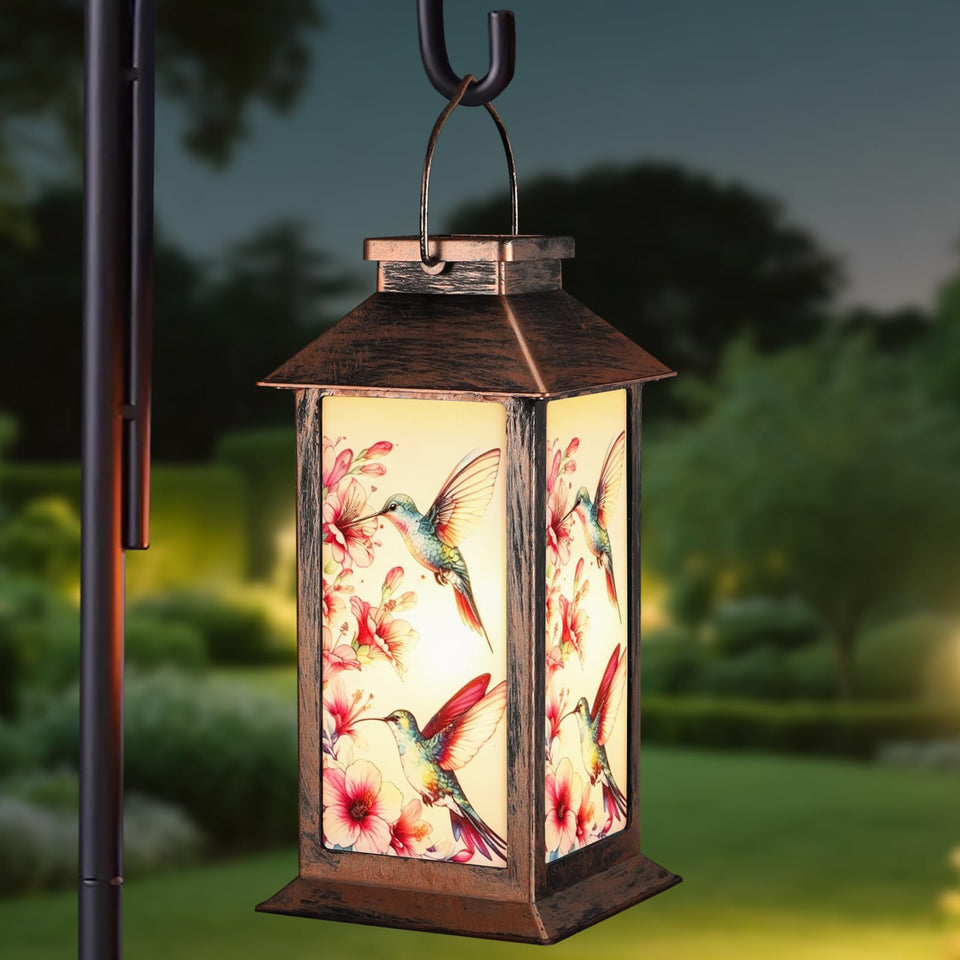 Yamodoor hanging solar lantern with hummingbird pattern for warm evening ambiance.