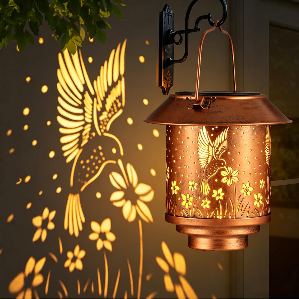 Yamodoor solar hanging lantern with hummingbird pattern for warm garden ambiance.