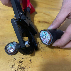 Yangoutool in-use image demonstrates secure grip during precise cuts in confined areas.