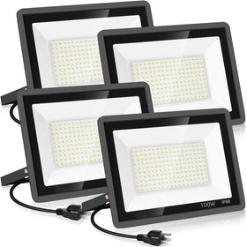 YANYCN 4 pack exterior flood lights illuminating outdoor space