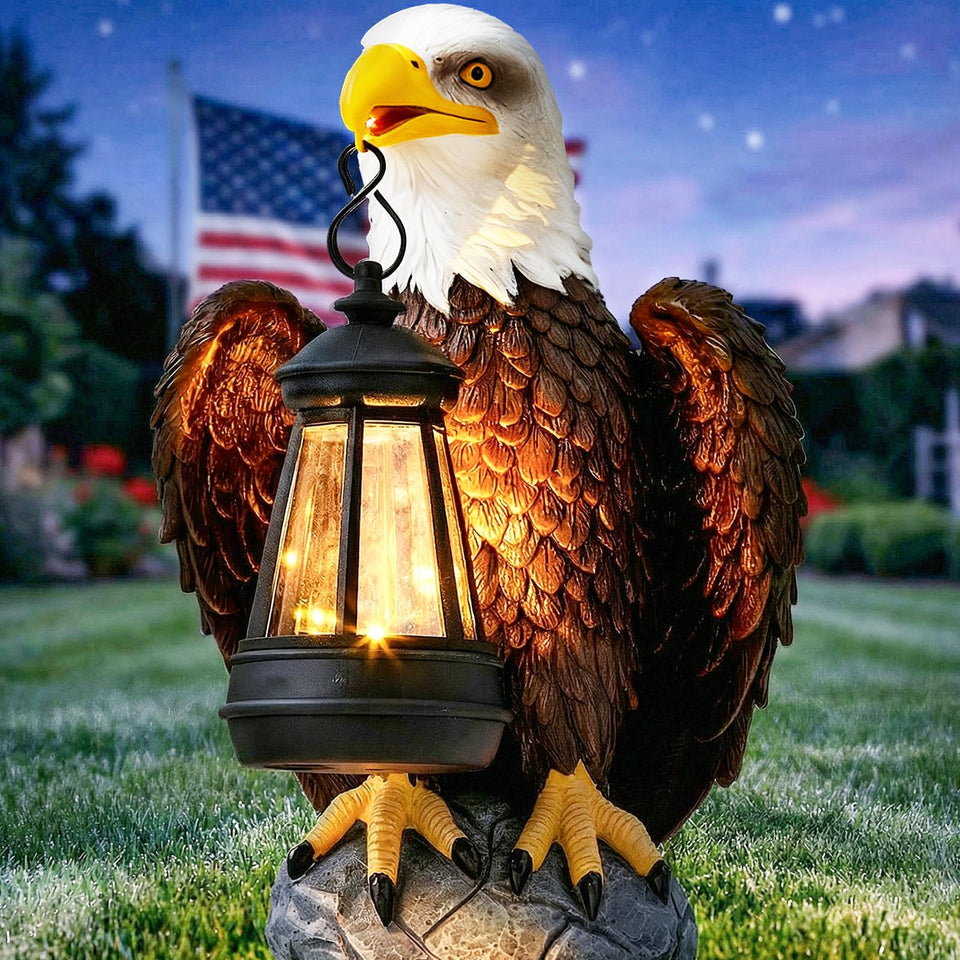 YDKOJGW bald eagle garden statue with solar light lighting your patio at night.