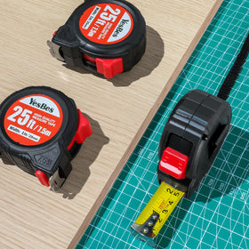 YesBes 25 ft blade extended for long measurements and quick layouts.