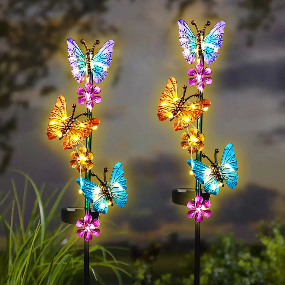 YHSOLAR butterfly light on stake glows softly for garden ambience.