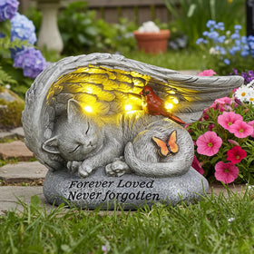 YHSOLAR cat memorial stone with solar angel wings illuminates garden at night