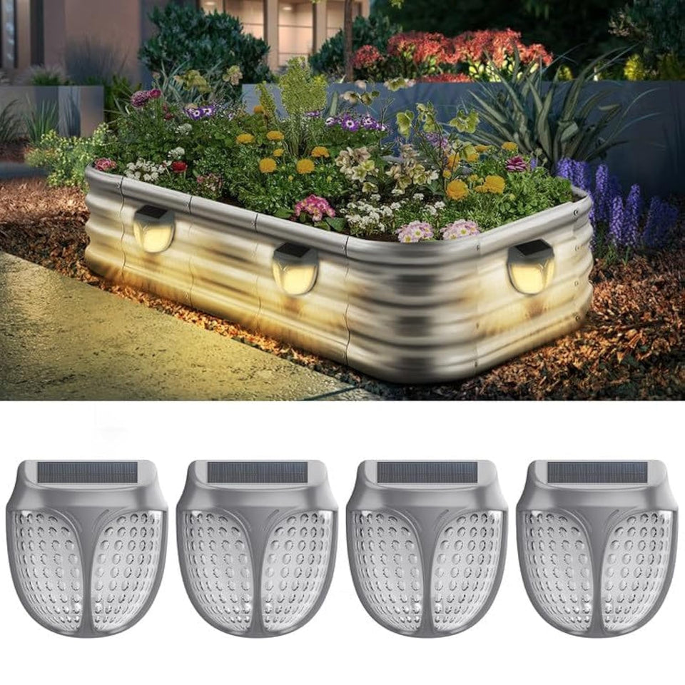 YINDUZ solar lights with magnetic attachment on garden bed for a cozy evening ambiance.