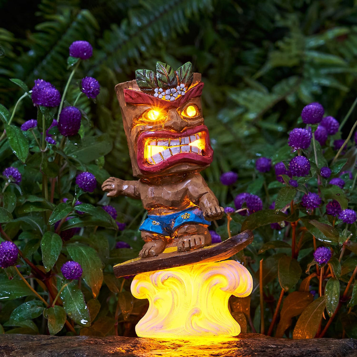 Yiosax surfing tiki statue adds backyard tiki bar ambience
