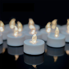 YiWER tea lights flicker like real candles, ideal for romantic table decor.