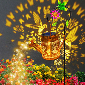 YJFWAL big solar lantern with hummingbird rose design lights the garden in the evening.
