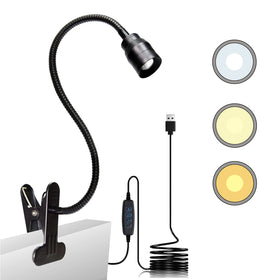 YMCRLUX zoomable LED reading light mounted on a bed headboard for focused illumination